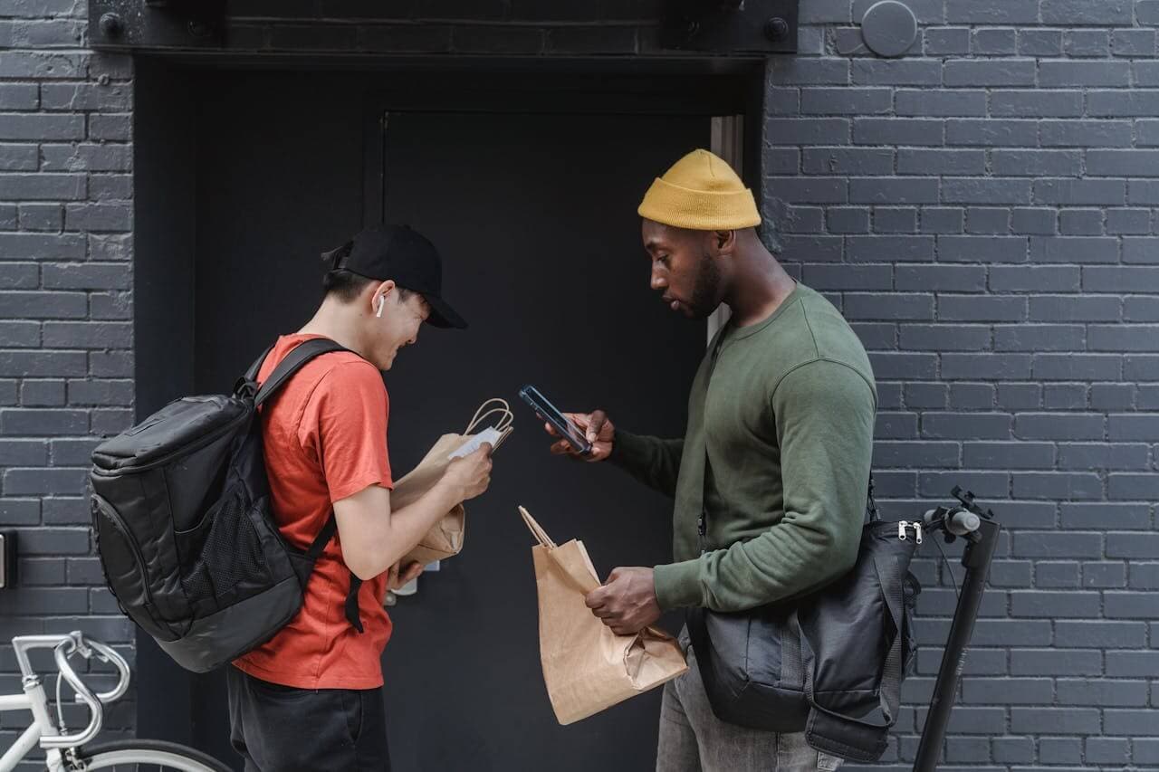 A Whiz Delivery courier completing a drop-off